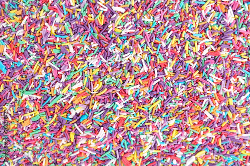 Sugar sprinkle dots. Multi color of sugar sprinkle dots for cake and bakery decoration. Can be used as colorful food background.