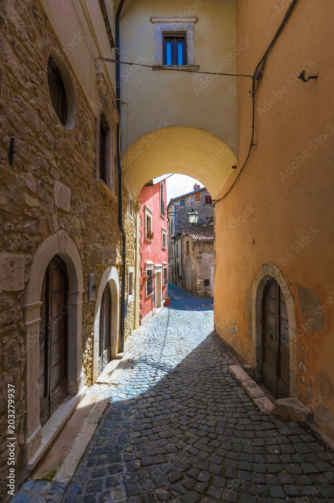 Obraz premium Tagliacozzo (Italy) - A small pretty village in the province of L'Aquila, in the mountain region of Abruzzo, during the spring. Here the historic center.