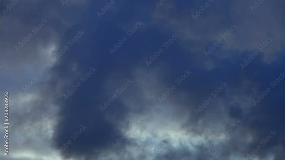 Dark and dramatic storm cloud area background. Time Lapse. Epic storm tropical clouds at sunset. Timelapse 4K UHD. Dark and dramatic storm cloud area background. Time Lapse. Epic storm tropical clouds at sunset. Timelapse 4K UHD.