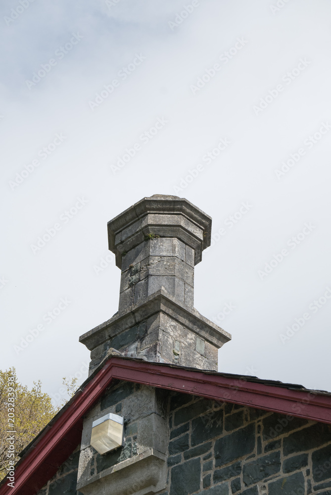 Octagonal designed chimney pot.