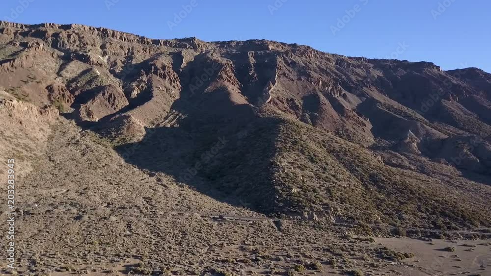 Mountain aerial view of the Teide National Park of Tenerife, drone shot along the wild in Canary Islands Mountain aerial view of the Teide National Park of Tenerife, drone shot along the wild in Canary Islands