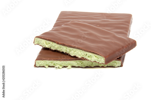 Milk chocolate with mint filling isolated on the white