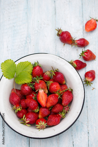 bowl with strawberries on white