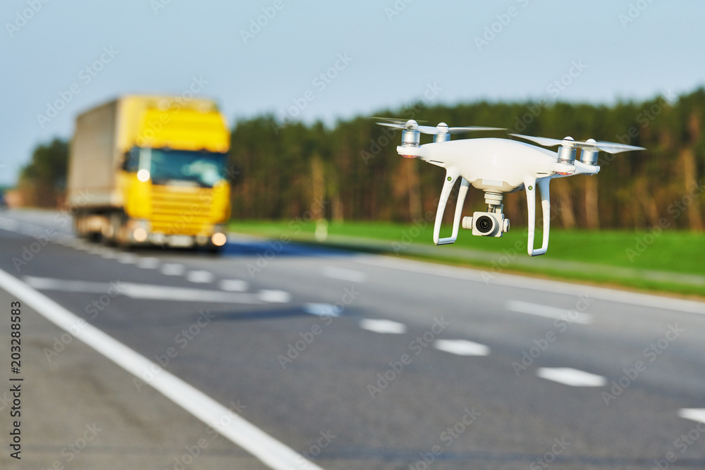drone and transportation. drone with camera controls highway road conditions