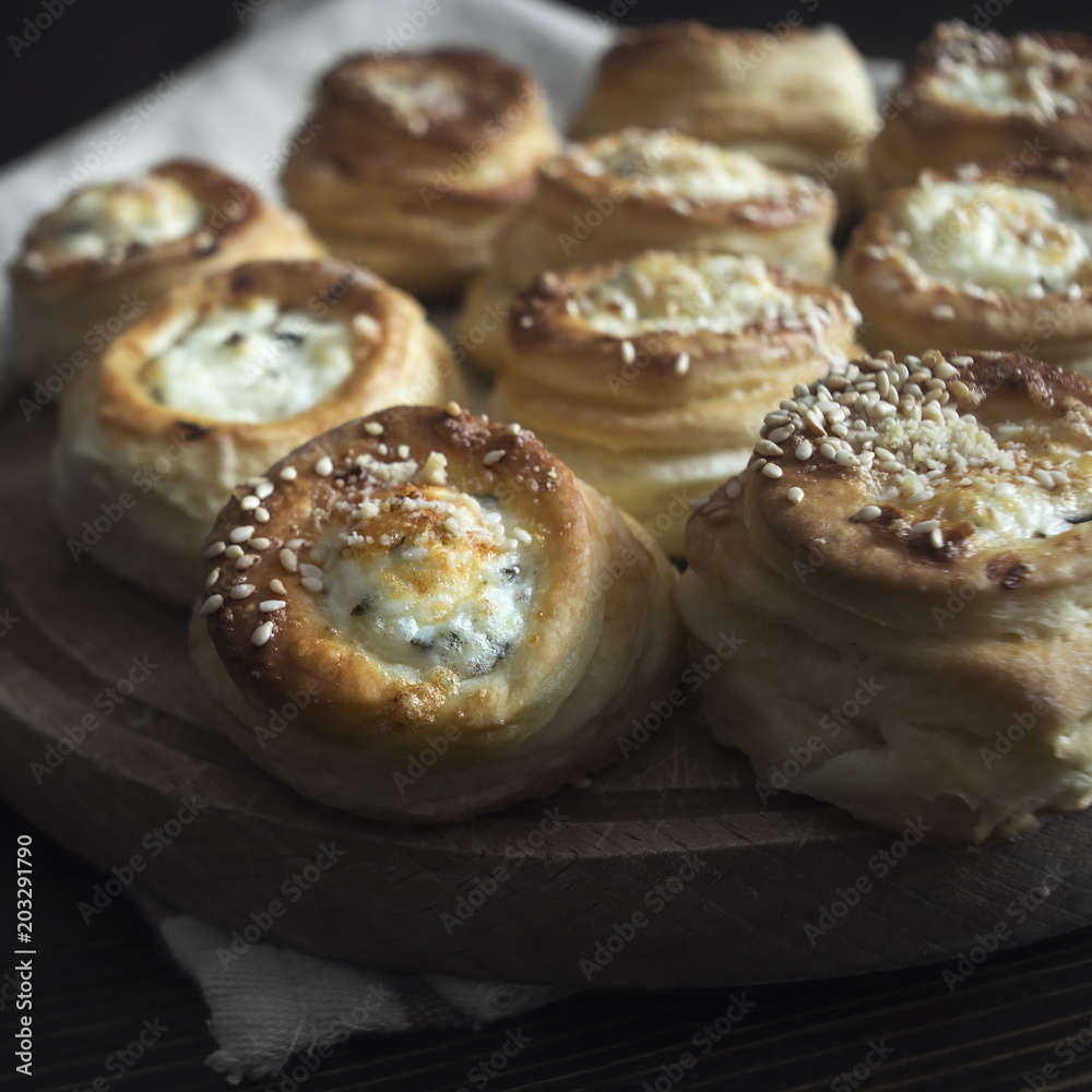 Delicious freshly baked pastry filled with cheese, from above Delicious freshly baked pastry filled with cheese, from above