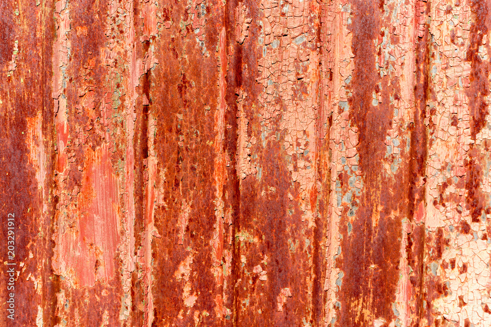 Red, rusty background with peeling paint. Red, rusty background with peeling paint.