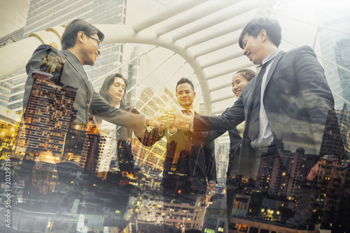 Double exposure group of business people working