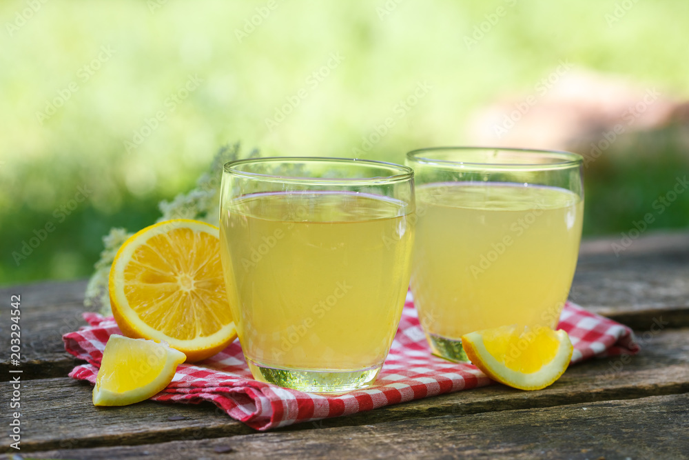 Delicious refreshing lemonade with fresh elderflower and lemon. Healthy summer drink. Delicious refreshing lemonade with fresh elderflower and lemon. Healthy summer drink.