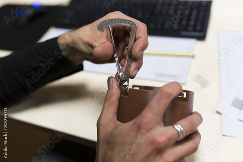 Cropped hands of male engineer working on 3D printed design