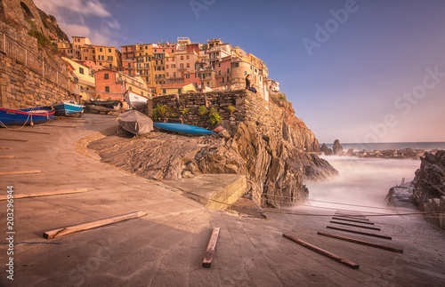 Port of Manarola with waves