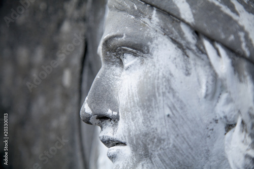 Fotografiet View in profile of an ancient statue of Mary Magdalene