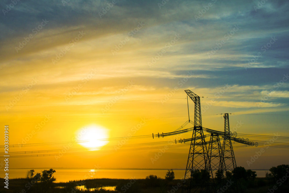 electric transmission line at sunset