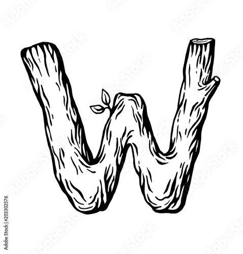 Black engraving Letter W made of wood with leaves on the white background