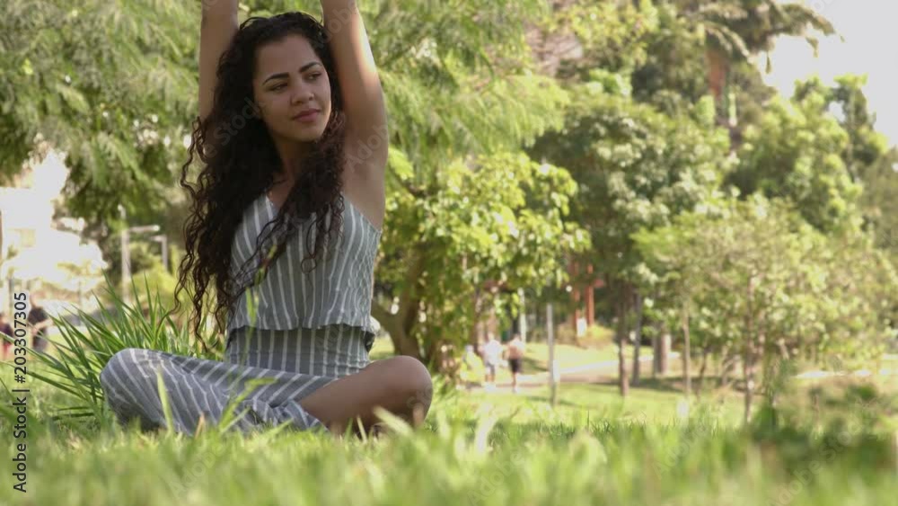 Fitness, woman training yoga pose outdoors in the park, copy space. Young slim girl makes exercise. Stretching, wellness, calmness, relax, healthy, active lifestyle concept Fitness, woman training yoga pose outdoors in the park, copy space. Young slim girl makes exercise. Stretching, wellness, calmness, relax, healthy, active lifestyle concept