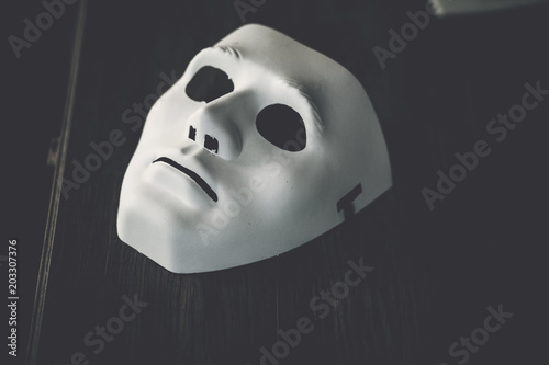 Facial sheet white mask on black background