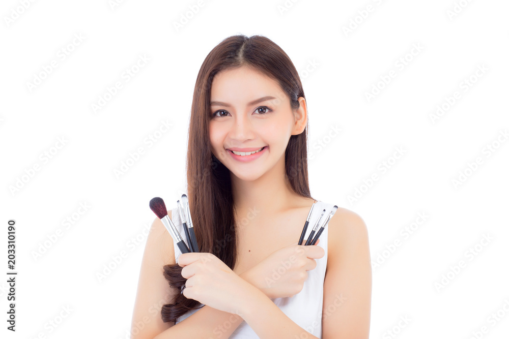 Beauty asian woman applying make up with brush on hand isolated on white background, beautiful of girl holding blusher, skincare and cosmetic concept. Beauty asian woman applying make up with brush on hand isolated on white background, beautiful of girl holding blusher, skincare and cosmetic concept.