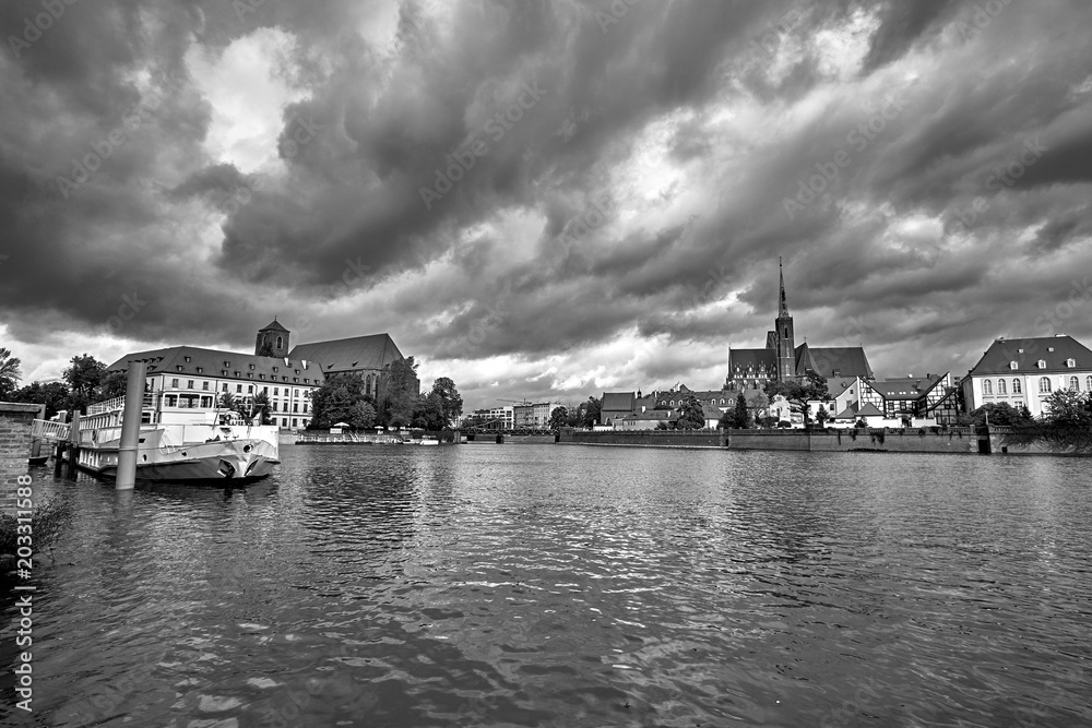 Cathedral Island in Wroclaw Poland with view on of St John the Baptist picturesque panorama medieval town. Black and white