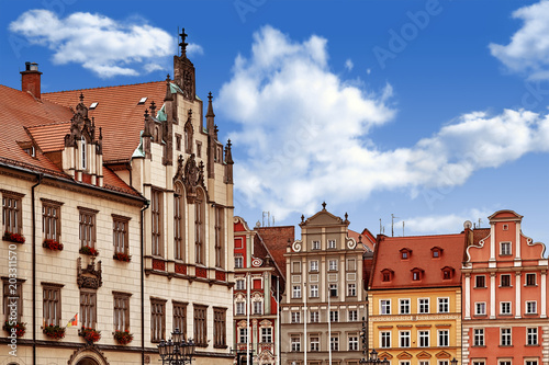 Central market square in Wroclaw Poland with old colourful houses. Travel vacation concept