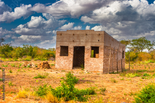 Unfinished house in the savannah. Africa. Kenya. Abandoned house in Africa.