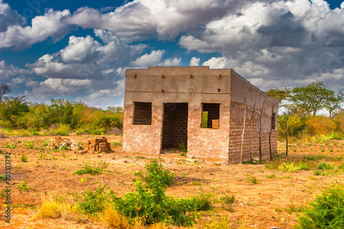 Unfinished house in the sav...