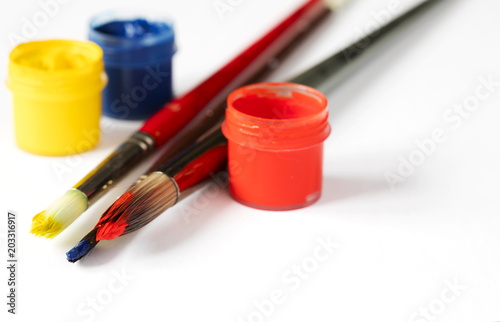 Paints and brushes. Art and craft background
