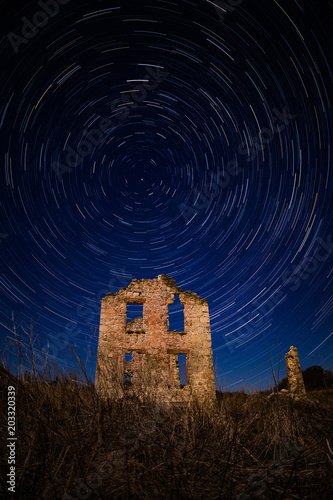 Star Trails Over Old Farm House