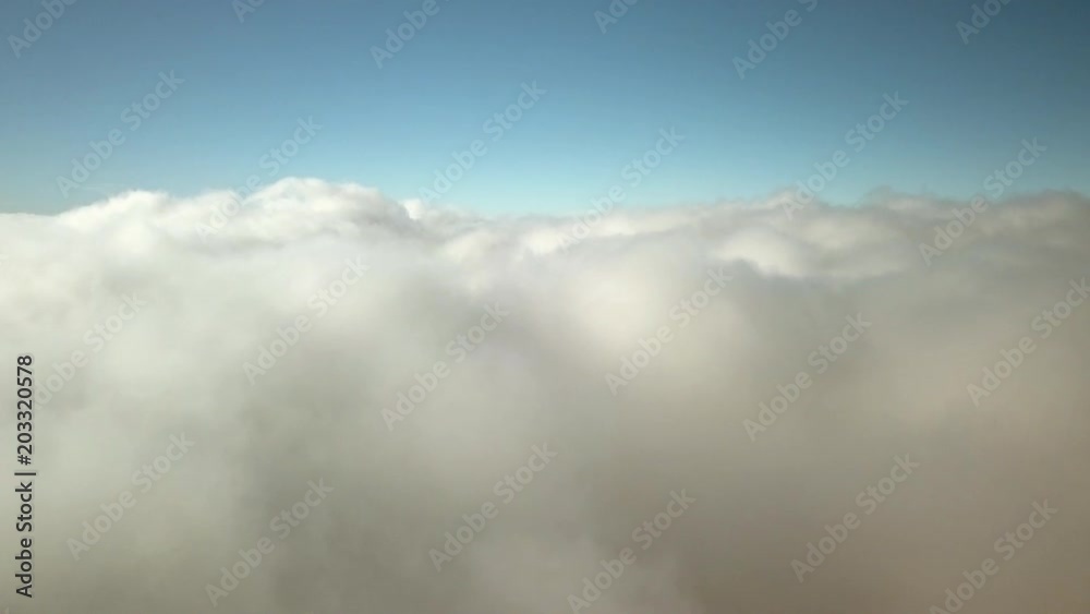 Sea of clouds in the sky on sunny day Sea of clouds in the sky on sunny day