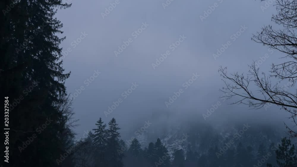 Timelapse of clouds and fog in the mountains