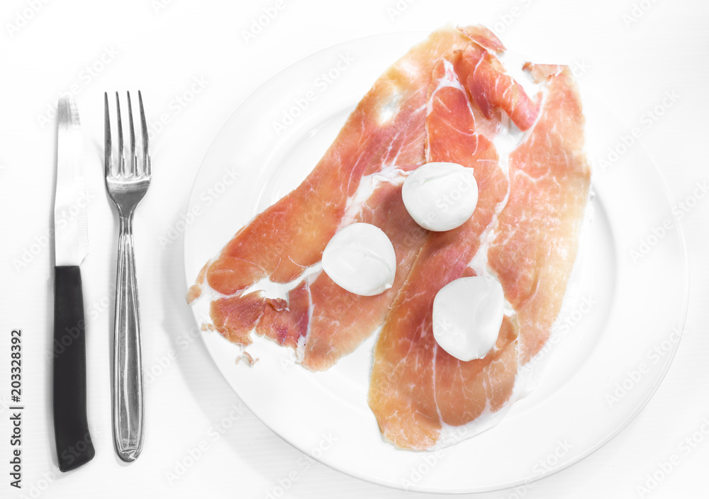 Italian raw ham and buffalo mozzarella from Campania, a typical and delicious appetizer