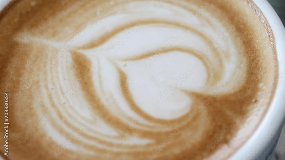 heart latte art of hot coffee drink in cup heart latte art of hot coffee drink in cup