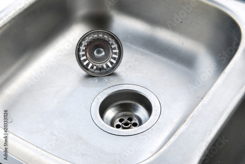 water drain into stainless steel sink