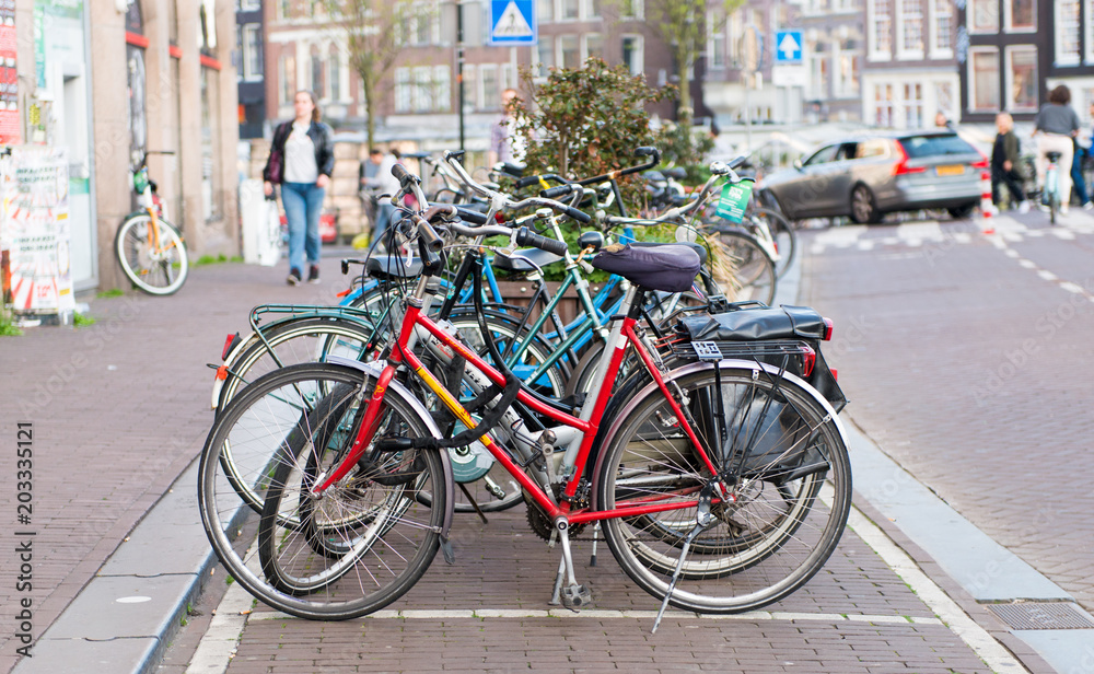 bicycles on the sidewalk in Amsterdam