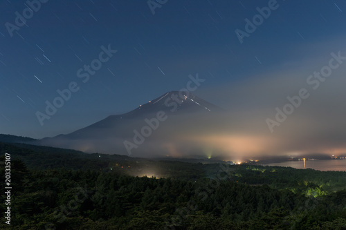 Nightscape of Mountain Fuji with cloud at Yamanaka lake © torsakarin