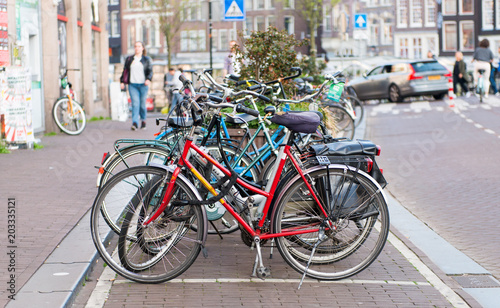 bicycles on the sidewalk in Amsterdam