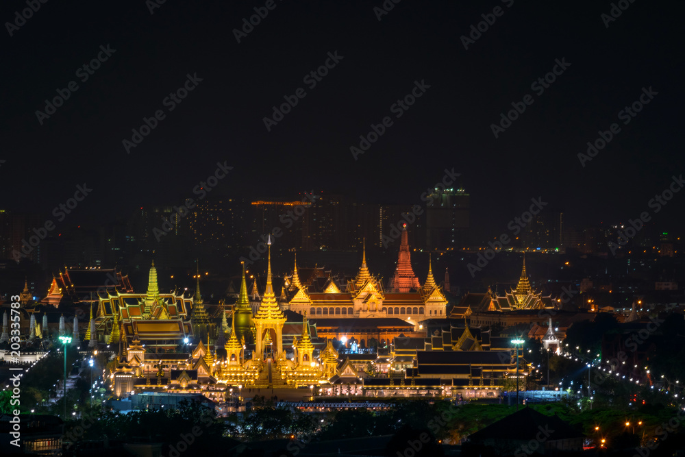 The Royal Cremation Ceremony of His Majesty of  King Bhumibol Adulyadej, stands tall in Sanam Luang  with Emerald Buddha and Wat Phra Kaew temple background