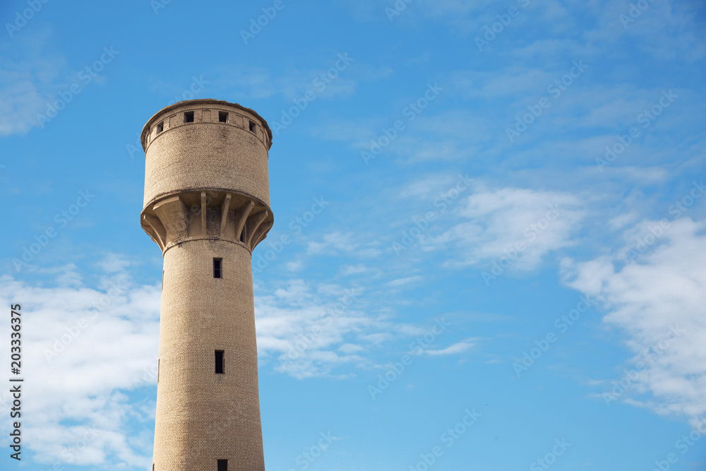 The tower against the blue sky.