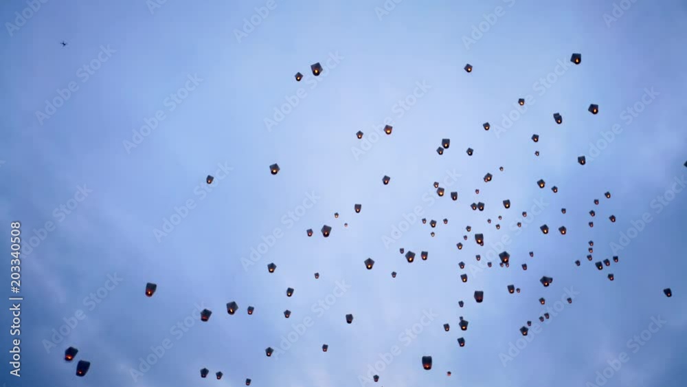 4K Many asian fire lanterns launching during buddhist festival in chinese new year in Taipei. Rice paper hot air balloons floating in traditional flying sky lantern celebration from Pingxi. Taiwan-Dan 4K Many asian fire lanterns launching during buddhist festival in chinese new year in Taipei. Rice paper hot air balloons floating in traditional flying sky lantern celebration from Pingxi. Taiwan-Dan