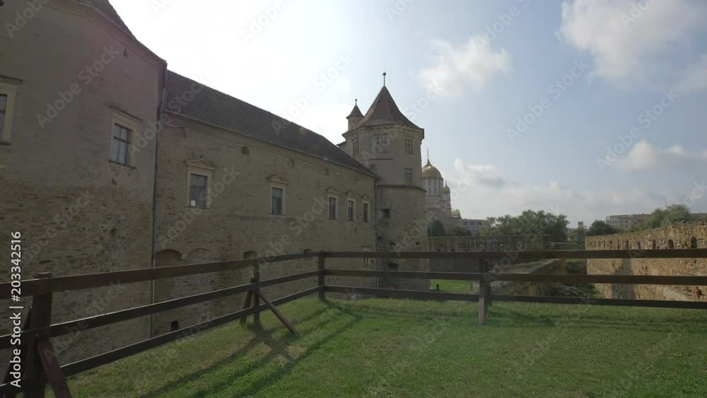 A medieval castle seen from a ledge A medieval castle seen from a ledge