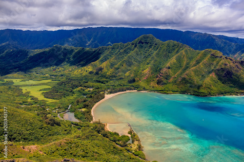 Aerial view Oahu coastline and mountains in Honolulu Hawaii from a helicopter