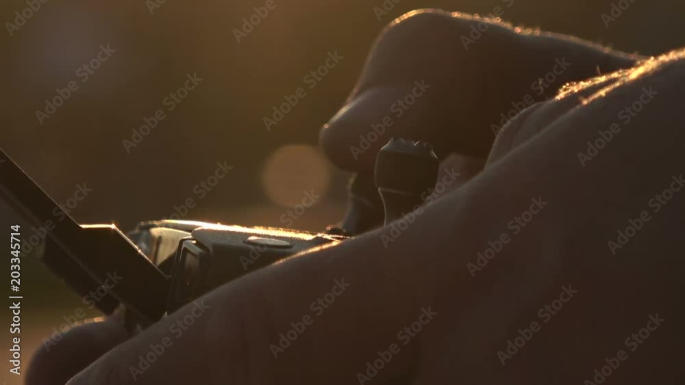 The operator's hands are an unmanned aerial vehicle with a remote control.