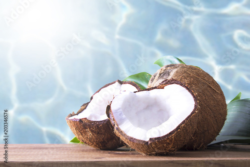 coconut open to natural on wooden bottom