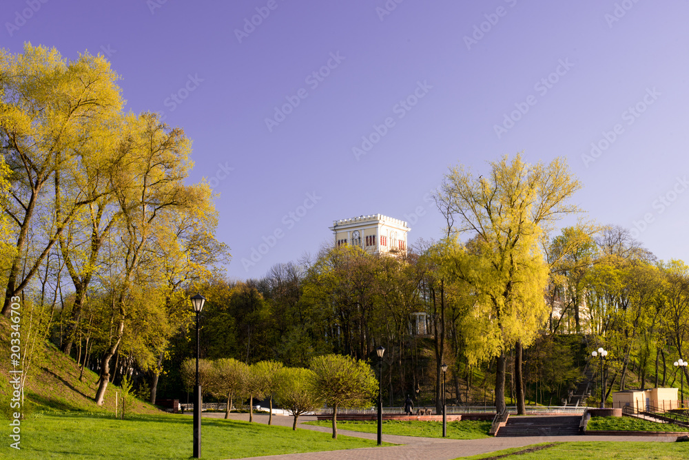 The clock tower is in the park