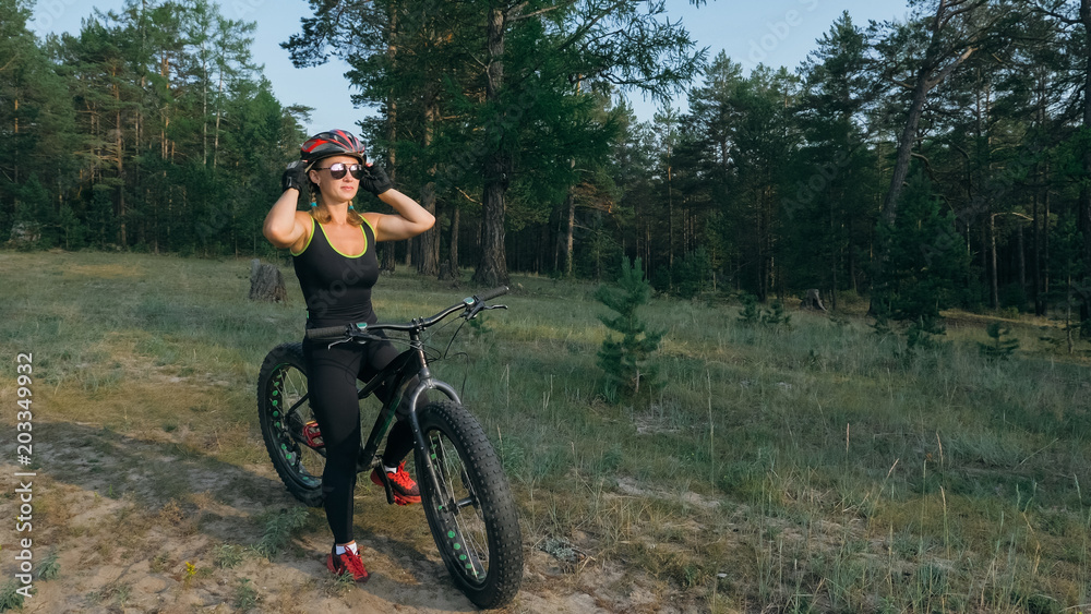 Fat bike also called fatbike or fat tire bike in summer riding in