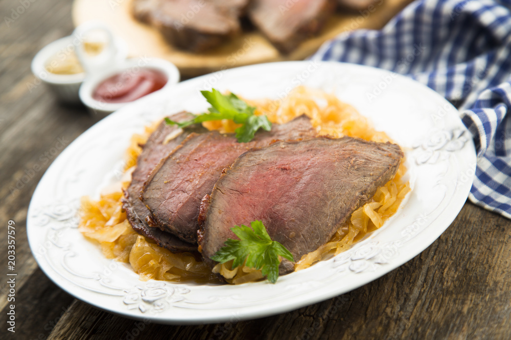 Beef fillet serves with sauerkraut