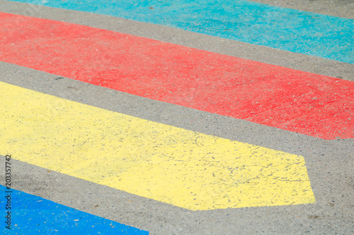 Colorful lines on a asphalt road.