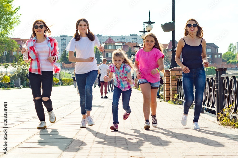 Fototapeta premium Group of mothers and daughters are running