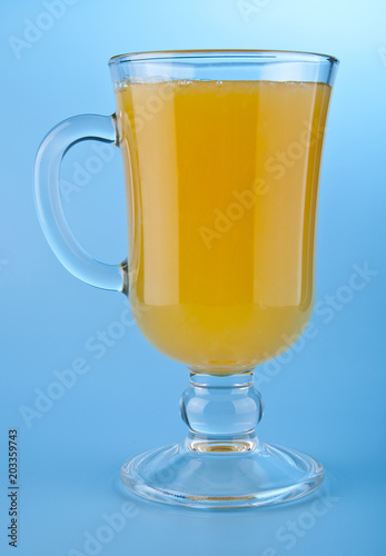 orange juice on a blue background