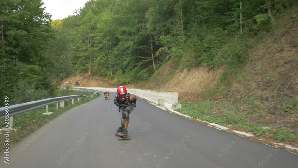 Longboarding on a road Longboarding on a road