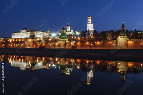 Panorama of the Moscow Kremlin with a mirror image in the Moscow river in the early morning, Russia