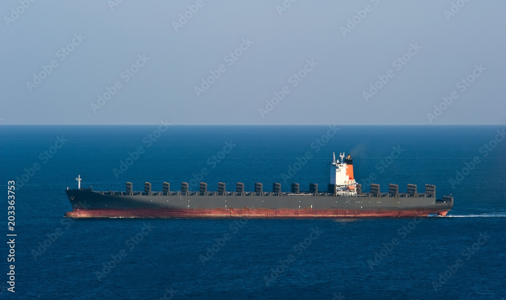 Fototapeta premium Empty container ship moving by sea.